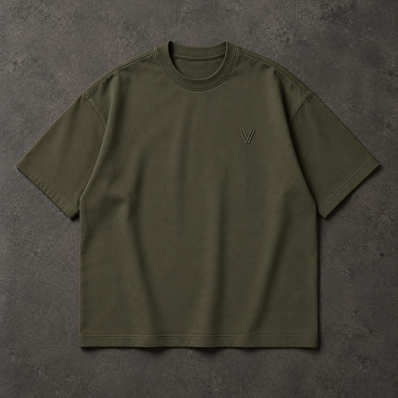 THE HEAVYWEIGHT — VETIVER laid flat on dark concrete
