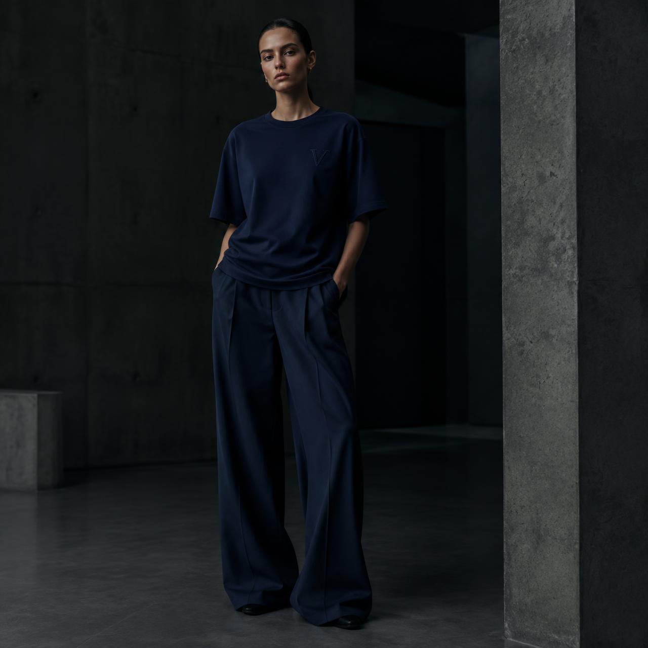 THE OVERSIZED HEAVYWEIGHT — MIDNIGHT laid flat on dark concrete