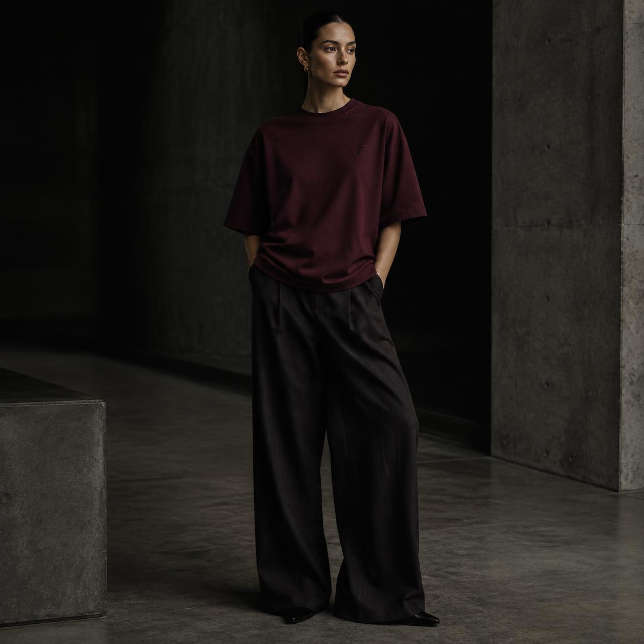THE OVERSIZED HEAVYWEIGHT — RESERVE laid flat on dark concrete